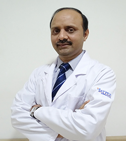 Dr Manik Sharma